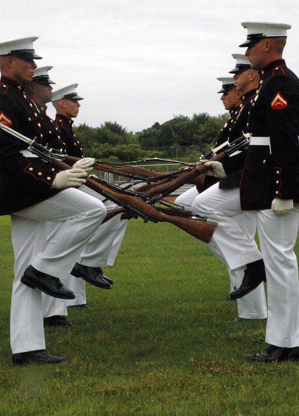The Marine Corps Silent Drill Platoon performed at Winnacunnet High School in Hampton, N.H., on June 22. Members of the Silent Drill Platoon are individually selected based on interviews conducted by personnel from Marine Barracks Washington, D.C.::r::::n::