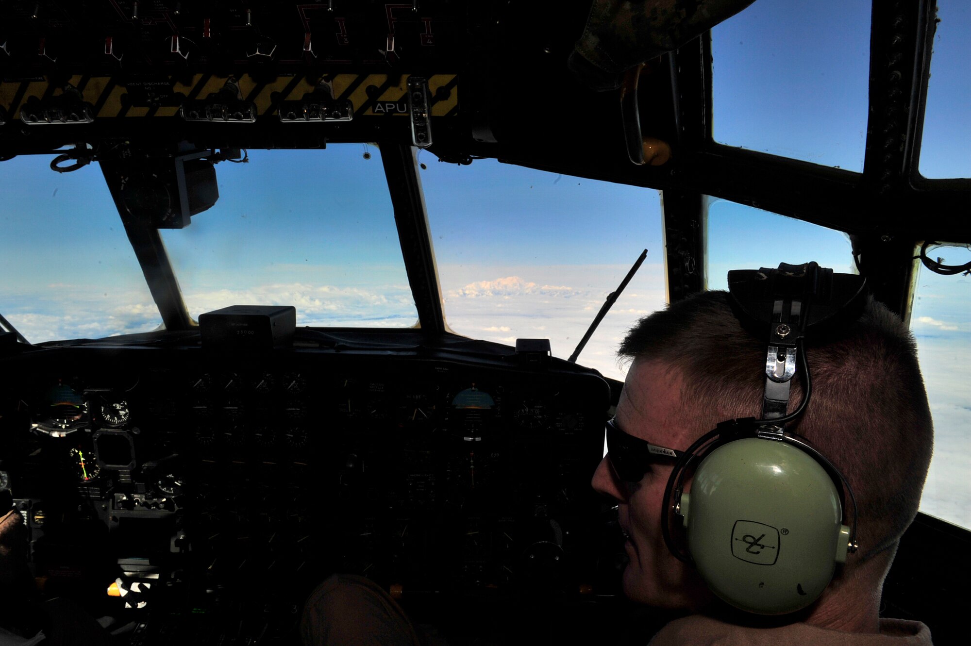 U.S. Marine Corps Lt. Col.  Bob Vander Woude, a KC-130 Hercules pilot with the Marine Aerial Transport Squadron (VMGR) 452, Stewart Air National Guard Base, N.Y., pilots the aircraft towards Mt. McKinley as the crew heads back to Eielson Air Force Base, Alaska, after completing an in-flight refueling mission, during the Northern Edge Premier Joint Training Exercise at the Joint Pacific Alaska Range Complex, June 21. More than 6,000 active duty, Reserve and National Guard personnel are participating in Northern Edge 2011. (U.S. Air Force photo/ Staff Sgt. Lakisha A. Croley)
