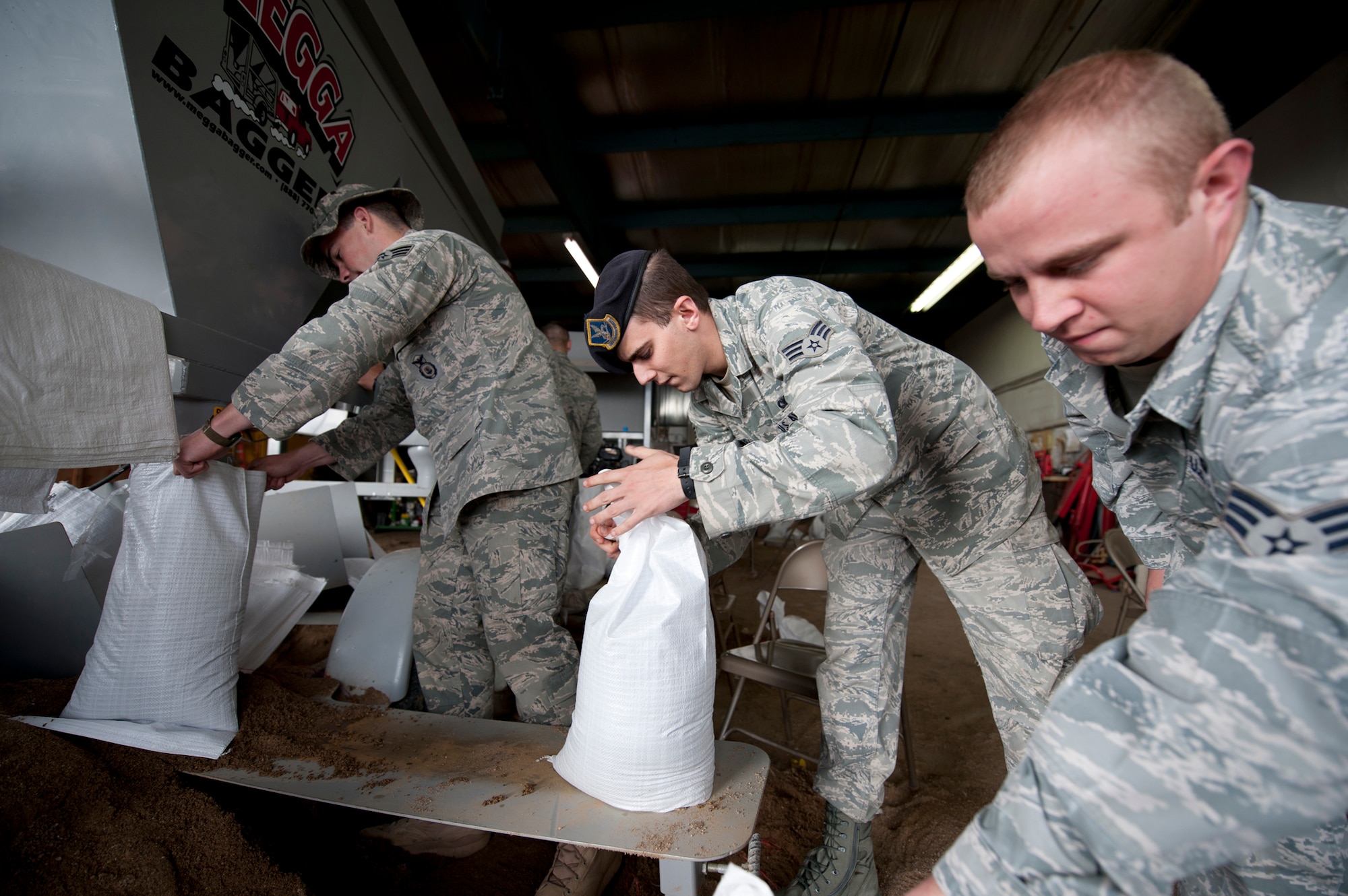 Minot Air Force Base, N.D.—Over 1,000 Airmen here helped to fill sandbags with a total weight of over 250 tons in preparation for the worst flood in history for the city of Minot. Local officials and residents have expressed their gratitude for the Airmen’s assistance. (U.S. Air Force photo/Staff Sgt. John D. Comer)
