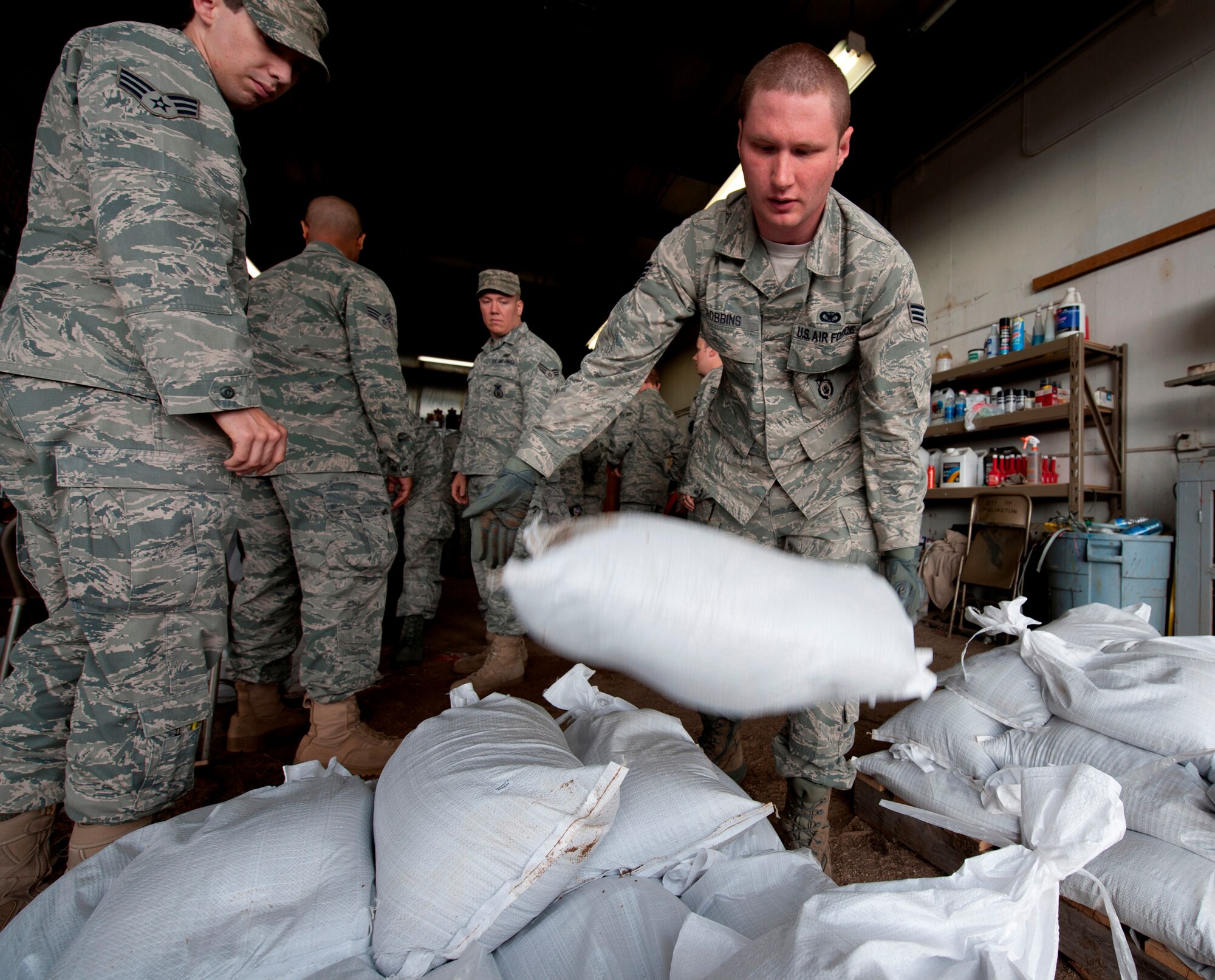 Minot Air Force Base, N.D.—Air Force Global Strike Command Airmen, Minot city officials, the National Guard, and the Corps of Engineers here are preparing for the worst flood in this city’s history. By Monday, June 29, 2011, Mouse River pressures and heights will reach unprecedented levels—seven to ten feet higher than the all time record with pressures reaching approximately 16,000 cubic feet per second. On June 22, 2011 the river, breached the levees and the warning sirens sounded requiring the immediate evacuation of over 11,000 Minot residents. (U.S. Air Force photo/Staff Sgt. John D. Comer)
