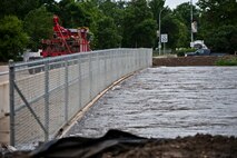 Minot Air Force Base, N.D.—Air Force Global Strike Command Airmen, Minot city officials, the National Guard, and the Corps of Engineers here are preparing for the worst flood in this city’s history. By Monday, June 29, 2011, Mouse River pressures and heights will reach unprecedented levels—seven to ten feet higher than the all time record with pressures reaching approximately 16,000 cubic feet per second. On June 22, 2011 the river, breached the levees and the warning sirens sounded requiring the immediate evacuation of over 11,000 Minot residents. (U.S. Air Force photo/Staff Sgt. John D. Comer)
