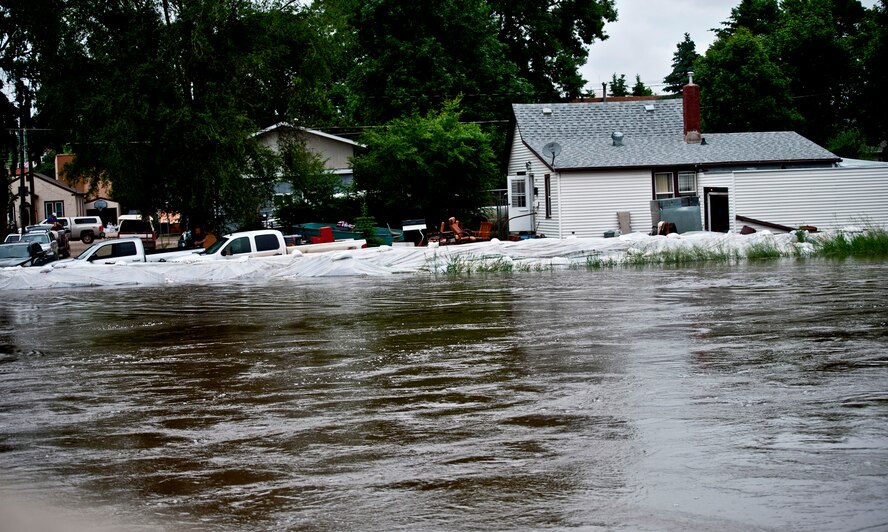 Minot Air Force Base, N.D.—Air Force Global Strike Command Airmen, Minot city officials, the National Guard, and the Corps of Engineers here are preparing for the worst flood in this city’s history. By Monday, June 29, 2011, Mouse River pressures and heights will reach unprecedented levels—seven to ten feet higher than the all time record with pressures reaching approximately 16,000 cubic feet per second. On June 22, 2011 the river, breached the levees and the warning sirens sounded requiring the immediate evacuation of over 11,000 Minot residents. (U.S. Air Force photo/Staff Sgt. John D. Comer)

