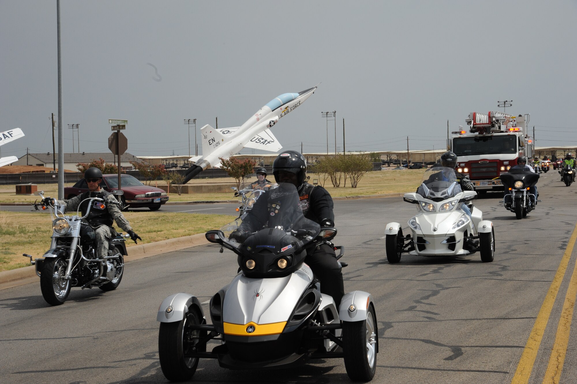 The Sheppard Green Knights Military Motorcycle Club (MMC) and base motorcycle riders come together for an awareness ride around the base June 20, during National Ride to Work Day. The event raises rider awareness and safety. More than 30 riders in the group were escorted around the base by members of the Sheppard Fire Department. (U.S. Air Force photo/Airman 1st Class Adawn Kelsey)