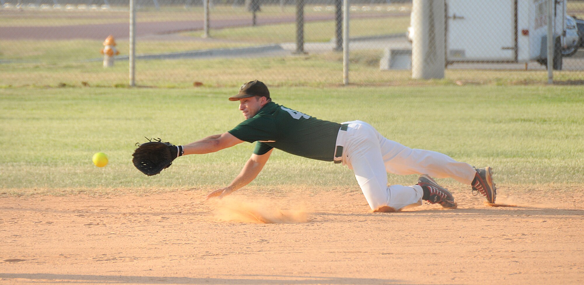 Gators second baseman Toby Jacob dives for a line drive. (U.S. Air Force photo by Kemberly Groue)