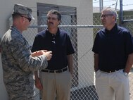 VANDENBERG AIR FORCE BASE, Calif. -- Lt. Col. Jamie Wakefield, 91st Maintenance Operations Squadron task force commander, conducts a missile alert facility tour for John Knecht, Minot Area Chamber of Commerce chair elect and Randy Hauck, board member for the MACC June 21. Colonel Wakefield discussed the role operators and maintainers play in order to ensure adequate operations. Both members were guests during the operational launch test of a Minuteman III intercontinental ballistic missile here. (U.S. Air Force photo/Airman 1st Class Jose L. Hernandez) 