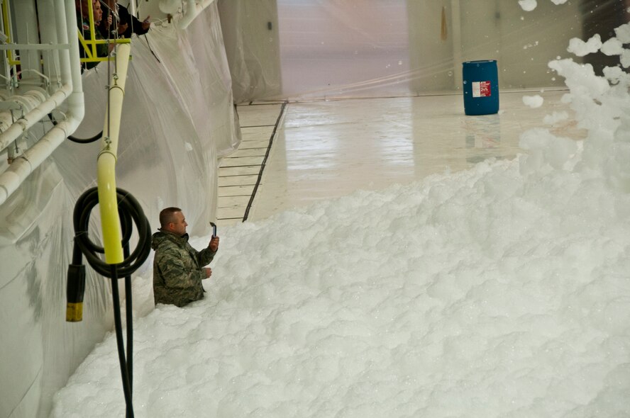 The 133rd Airlift Wing preformed a fire suppression test on June 15, 2011 filling the south hanger in St. Paul Minn. with six feet of foam.  This ground water safe foam is made up of 97 percent water which filled the hanger in just a few minutes. U.S. Air Force Photo by SrA. Kennith Veillon (released)