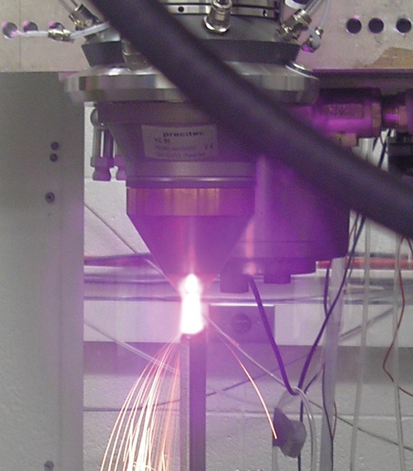 The Missouri University of Science and Technology hybrid laser deposition and machining system, which integrates laser deposition with machining processes to form a hybrid manufacturing process to build precision metal parts for aerospace components.  (AFRL image)