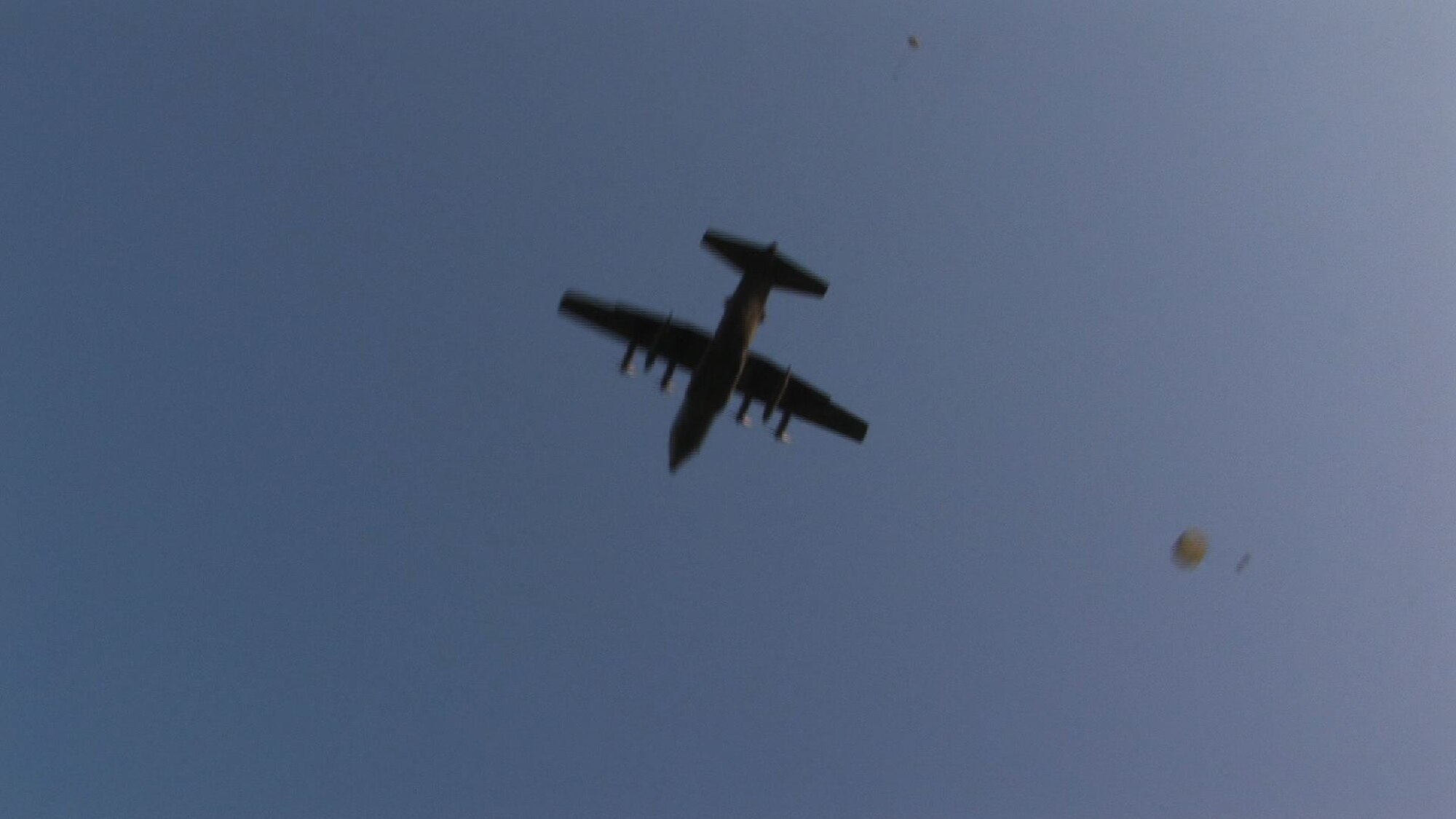 The 934th Airlift Wing conducts Inproved Container Delivery System training at the Arno Drop Zone at Camp Ripley, Minn. (Air Force Photo/Wendy Cormier) 
