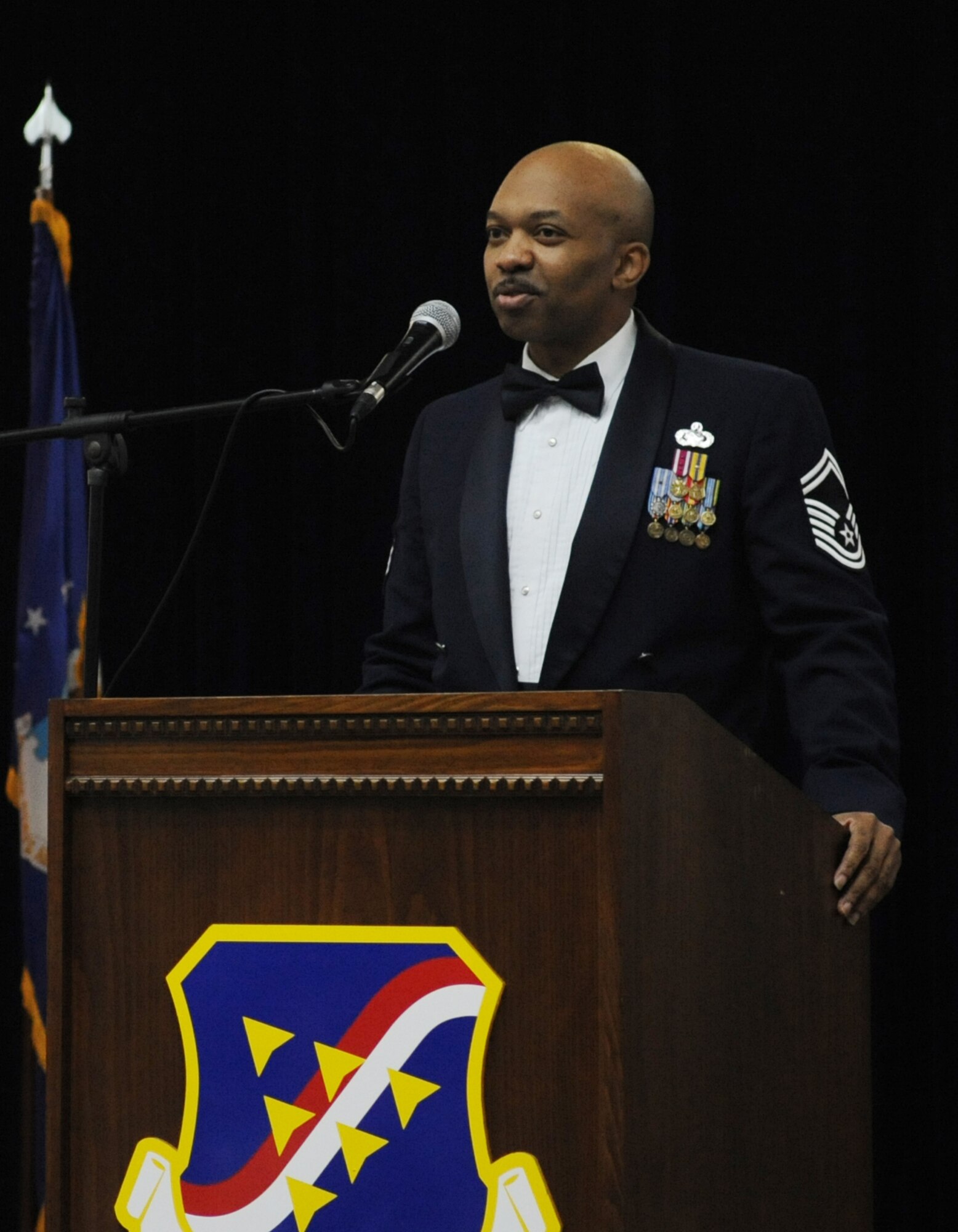 Senior Master Sgt. Jeffery Clayton, Airman Leadership School Class 11-6 mentor, speaks to attendees of the ALS Class 11-6 graduation June 20, 2011, at the Club Complex at Incirlik Air Base, Turkey. The graduates of Class 11-6 are Senior Airmen Roberto Alejandro, Natalie Anderson, Tyson Biela, Seth Bolz, Nellie Bourdier, Brian De Los Santos, Anthony Farley, Nicholas  Koch, Andrew Lomax, Sarah Mahlum, Cameron Phillips, Cody Skipper, Roland Smith and Jesse Zwawa. (U.S. Air Force photo by Airman 1st Class Clayton Lenhardt/Released)