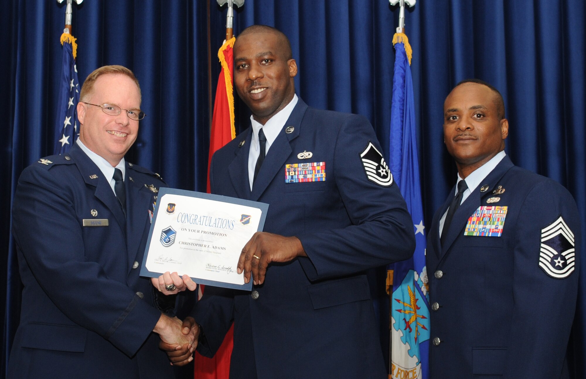 Christopher Adams, 728th Air Mobility Squadron, is promoted to the rank of master sergeant May 31, 2011 at the Club Complex Ballroom. (U.S. Air Force Photo by Airman 1st Class Clayton Lenhardt/Released)