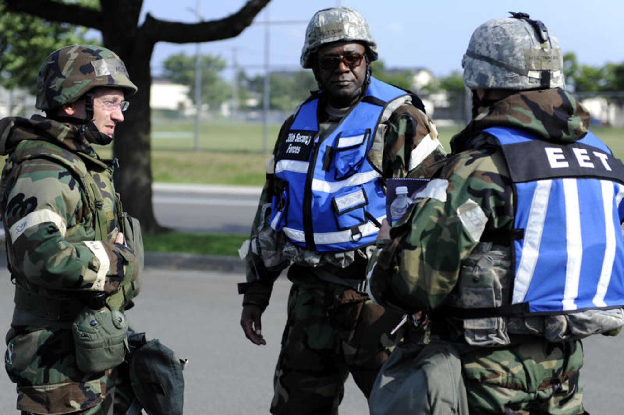 MISAWA AIR BASE, Japan -- Col. Michael Rothstein, 35th Fighter Wing commander, talks with members of the exercise evaluation team during an exercise scenario June 22. The FW is engaged in a week-long exercise, simulating a variety of scenarios in a combat environment. (U.S. Air Force photo/Staff Sgt. Marie Brown/RELEASED)