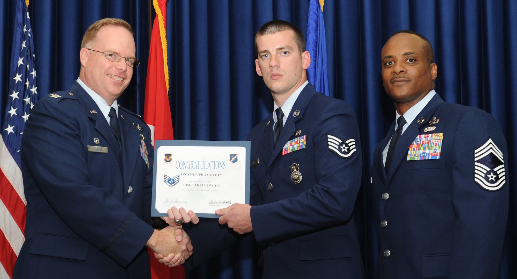 Joseph White, 39th Security Forces Squadron, is promoted to the rank of staff sergeant May 31, 2011 at the Club Complex Ballroom. (U.S. Air Force photo by Airman 1st Class Clayton Lenhardt/Released)