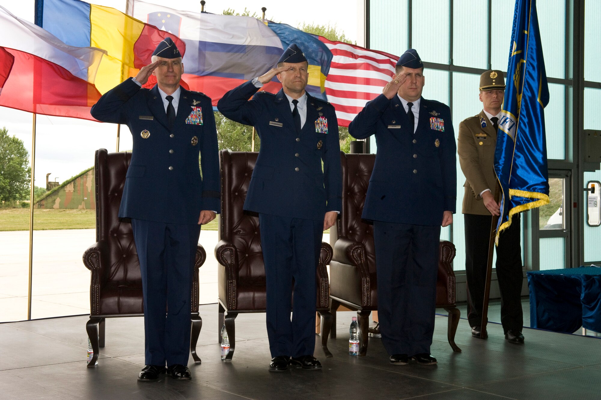 U.S. Air Force Maj. Gen. Mark Schissler (left), Col. John Zazworsky and Col. Keith Boone salute during the Hungarian and United States national anthem for the first multinational Heavy Airlift Wing Change of Command ceremony, Papa Air Base, Hungary, June 17, 2011. (U.S. Air Force photo/TSgt Wayne Clark, AFNE Regional News Bureau) (Released)