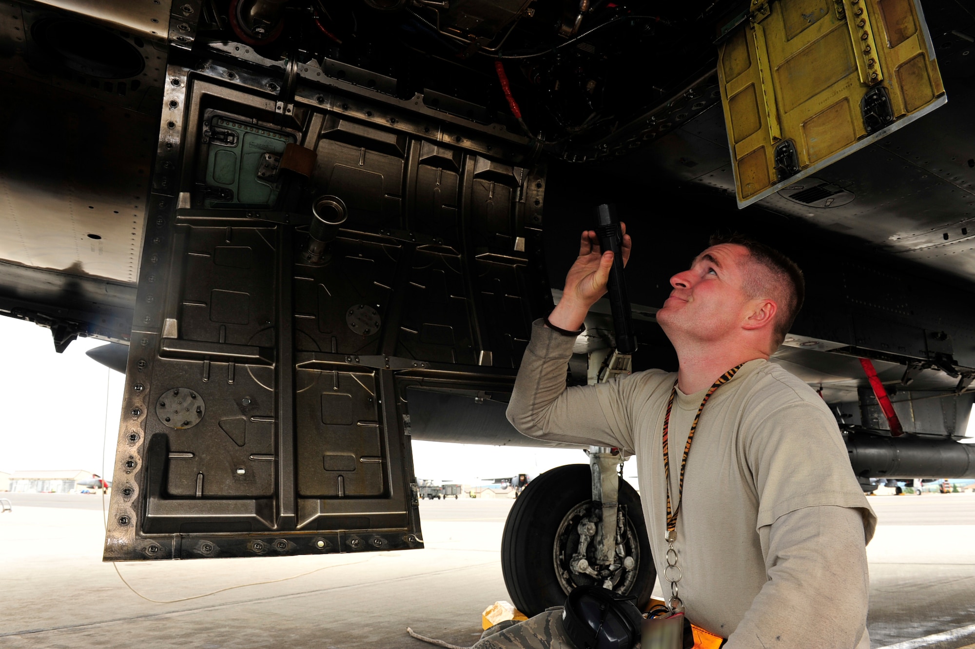 U.S. Air Force Staff Sgt. Joseph Ramsey, a crew chief assigned to the 391st Aircraft Maintenance Unit, Mountain Home, Idaho, inspects an F-15 Eagle at Eielson Air Force Base, Alaska, June 23. Sergeant Ramsey is here in support of the Northern Edge Premier Joint Training Exercise.  He is among the group of more than 8,500 Airmen the Air Force announced June 23 that were selected for promotion to the rank of technical sergeant.  (U.S. Air Force photo/Staff Sgt. Lakisha A.Croley)