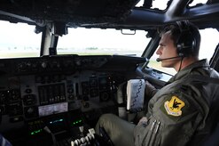 JOINT BASE ELMENDORF- RICHARDSON, Alaska -- Air Force Capt. Dustin Canedy, E-3 Sentry Airborne Warning and Control System co-pilot, prepares for take off before a training mission during Exercise Northern Edge 11 in JBER, Alaska, June 22, 2011. Northern Edge, Alaska's largest military training exercise, is designed to prepare joint forces to respond to crises throughout the Asia-Pacific region. (U.S. Navy photo/Mass Communication Specialist 2nd Class Rufus Hucks)