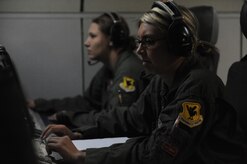 JOINT BASE ELMENDORF- RICHARDSON, Alaska -- Senior Airman Christie Chatham, E-3 Sentry Airborne Warning and Control System air surveillance technician, monitors airspace during a training mission during Exercise Northern Edge 11 in JBER, Alaska, June 22, 2011. Northern Edge, Alaska's largest military training exercise, is designed to prepare joint forces to respond to crises throughout the Asia-Pacific region. (U.S. Navy photo/Mass Communication Specialist 2nd Class Rufus Hucks)