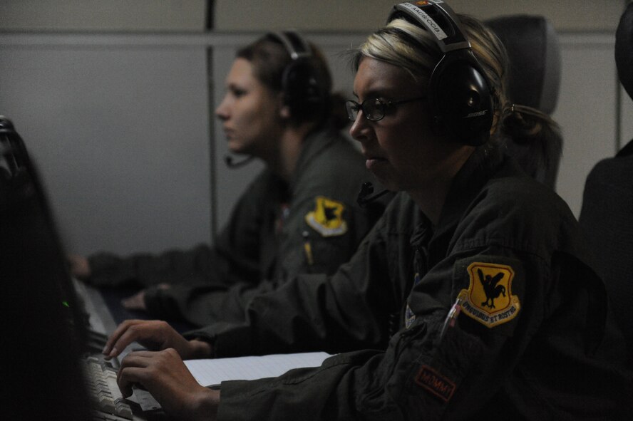 JOINT BASE ELMENDORF- RICHARDSON, Alaska -- Senior Airman Christie Chatham, E-3 Sentry Airborne Warning and Control System air surveillance technician, monitors airspace during a training mission during Exercise Northern Edge 11 in JBER, Alaska, June 22, 2011. Northern Edge, Alaska's largest military training exercise, is designed to prepare joint forces to respond to crises throughout the Asia-Pacific region. (U.S. Navy photo/Mass Communication Specialist 2nd Class Rufus Hucks)