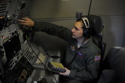 JOINT BASE ELMENDORF-RICHARDSON, Alaska -- Airman 1st Class James Makarzyk, E-3 Sentry Airborne Warning and Control System communications technician, performs pre-flight checks before a training mission during Exercise Northern Edge 11 in JBER, Alaska, June 22, 2011. Northern Edge, Alaska's largest military training exercise, is designed to prepare joint forces to respond to crises throughout the Asia-Pacific region. (U.S. Navy photo/Mass Communication Specialist 2nd Class Rufus Hucks)