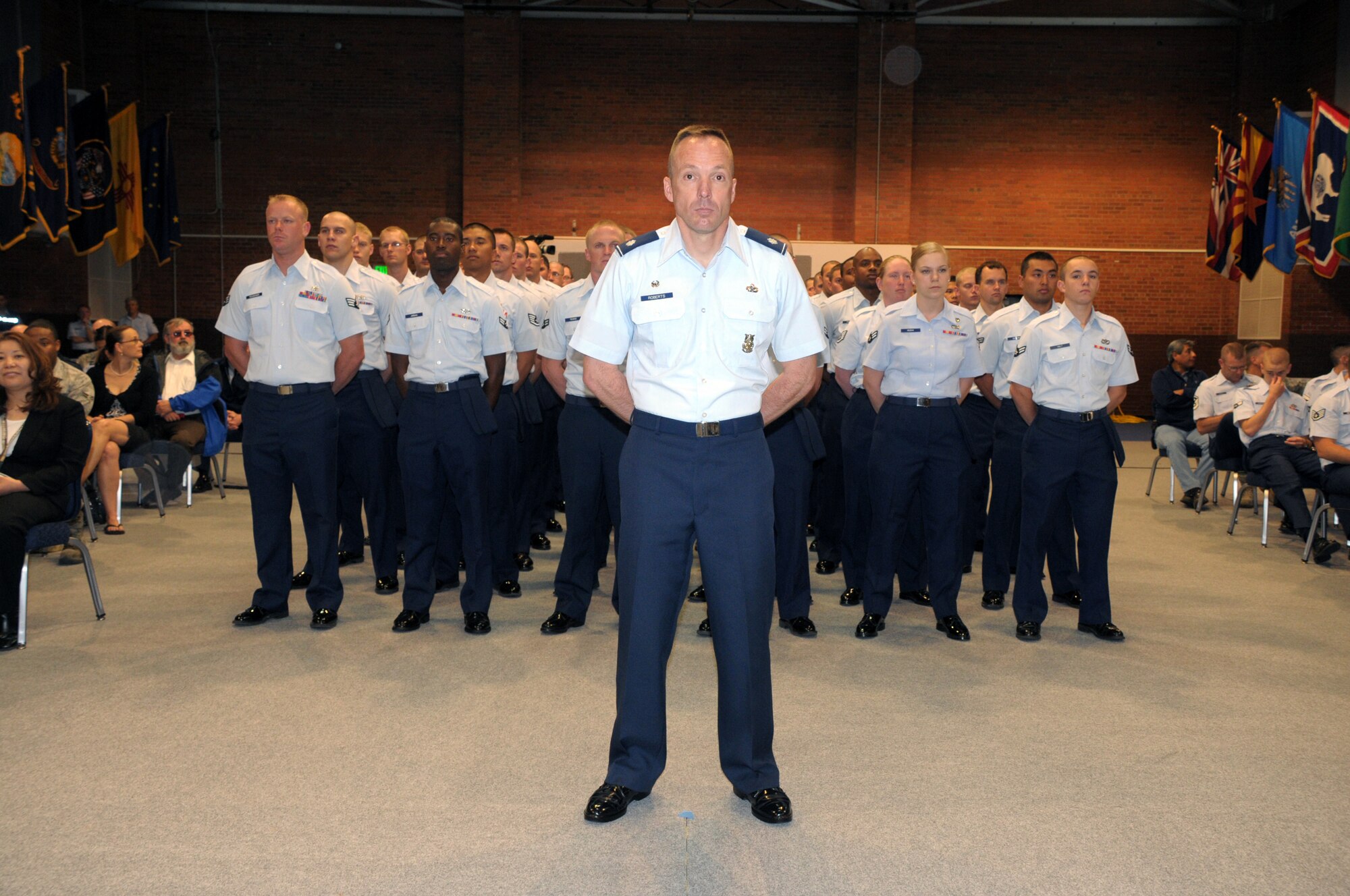 Lieutenant Col. Charles Roberts, 90th Civil Engineer Squadron, stands front and center in formation with members of the 90th Mission Support Group during the 90th MSG change of command in the Fall Hall Community Center Monday. (U.S. Air Force photo by Blaze Lipowski)