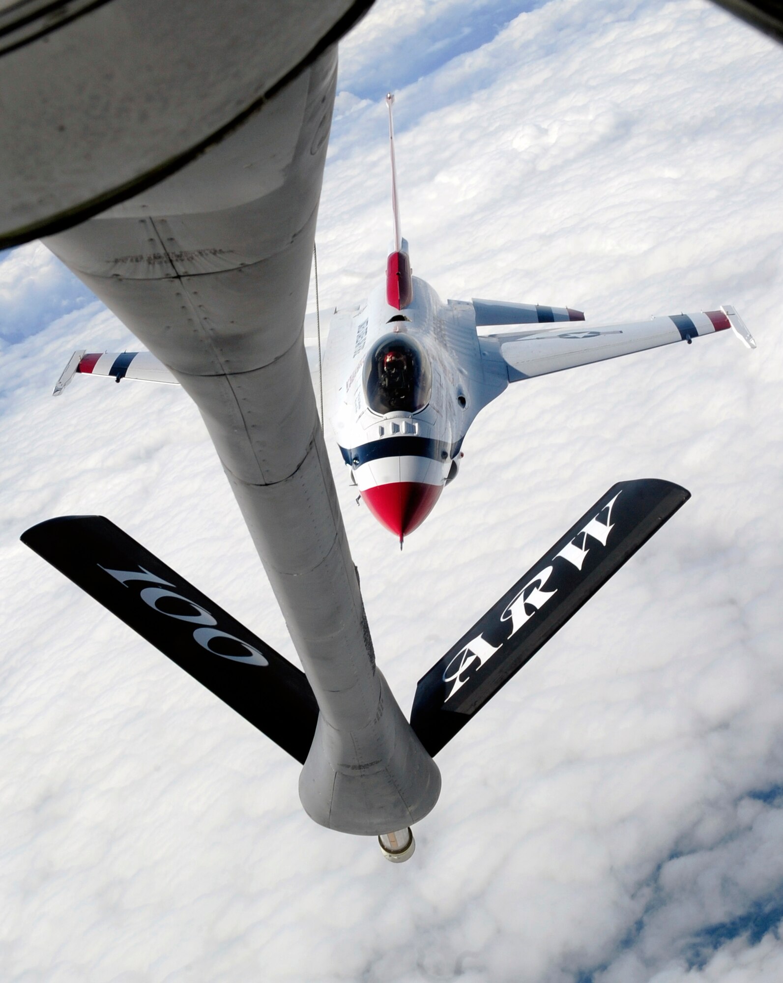 LATVIA, Northern Europe – One of the U.S Air Force Thunderbirds, a F-16 Fighting Falcon, approaches a 100th Air Refueling Wing KC-135 Stratotanker June 22, 2011. Once close enough to the KC-135, the Thunderbird connects to the boom to be refueled. (U.S. Air Force photo/Senior Airman Ethan Morgan)