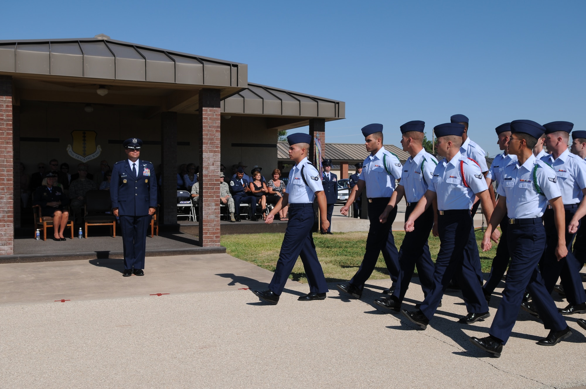 GOODFELLOW AIR FORCE BASE, Texas -- Col. Mark Damiano reviews Team Goodfellow during the Pass In Review parade at the Change of Command ceremony June 23. Colonel Damiano is the 58th commander of the 17th TRW. (U.S. Air Force photo/Staff Sgt. Heather L. Rodgers)