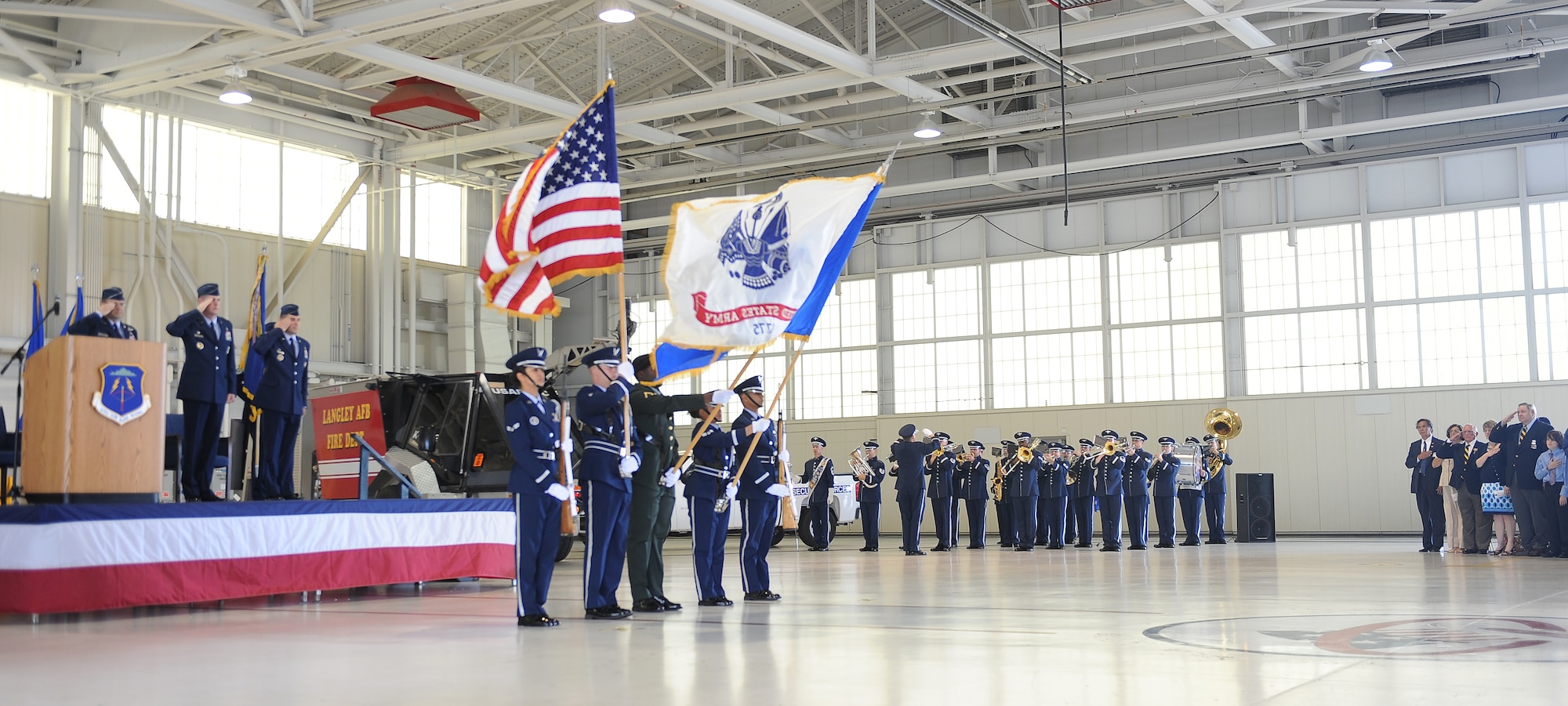 U. S. Joint Services Color Guard presents the colors during the 633d Air Base Wing change of command ceremony at Langley Air Force Base, Va., June 23, 2011. Col.  Korvin Auch assumed command of the wing from Col. Donald Kirkland. (U.S. Air Force photo by Staff Sgt. Antoinette Gibson/Released)

