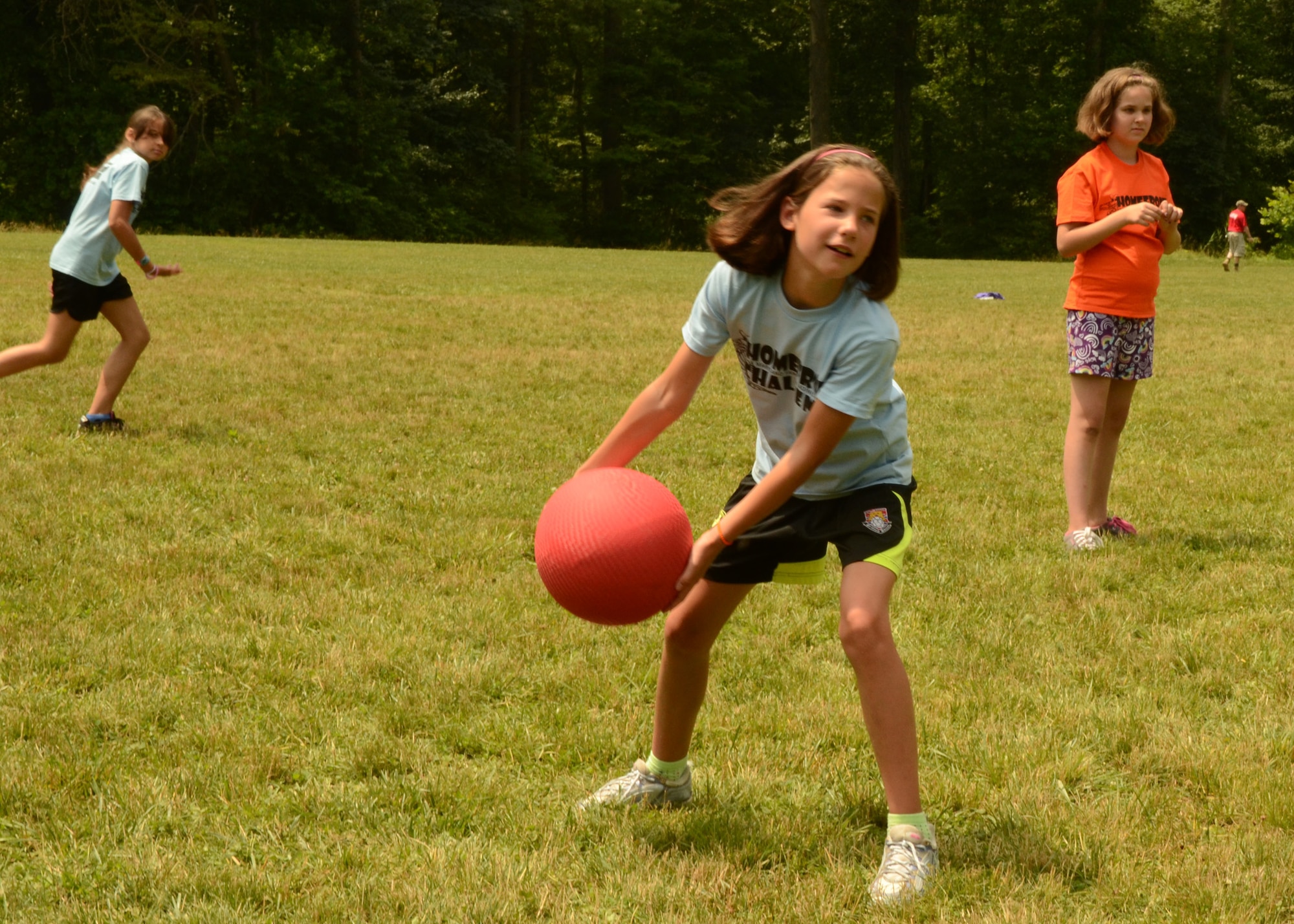 Jamie Llewellyn, a camper at the Homefront Challenge Camp pitches the ball during a kickball game.  The Homefront Challenge Camp is a week-long camp for children who have parents or guardians serving in the Maryland Army or Air Force National Guard.  The campers have the opportunity to participate in many different activities including flag football, kickball and archery. The Homefront Challenge took place over the week of June 20-24 at Rock State Park in Jarrettsville, Maryland.