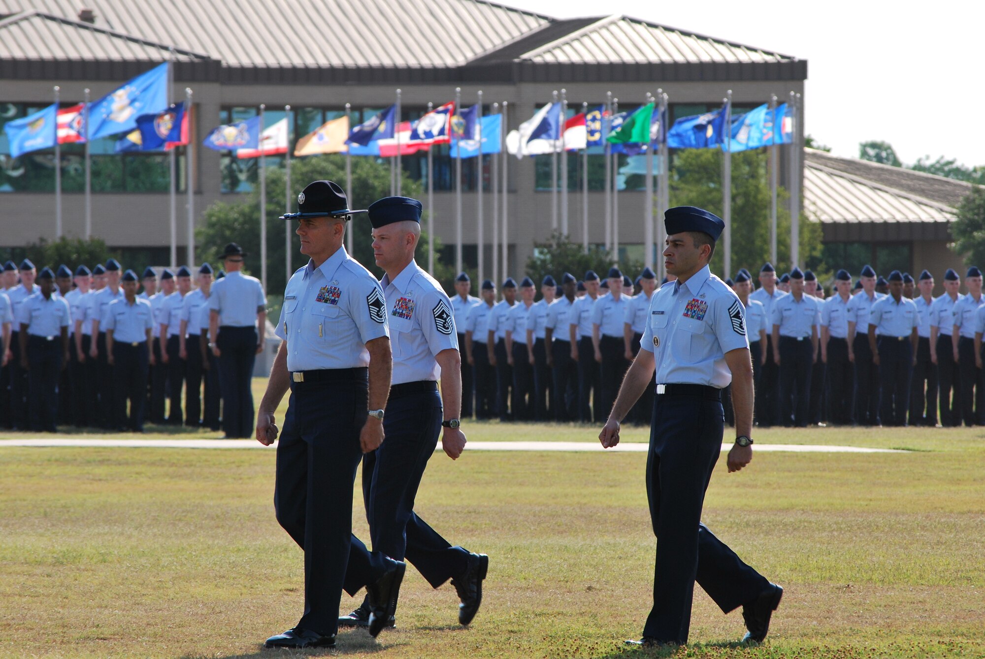Air Force Recruiting Service Command Chief Master Sgt. Ruben Gonzalez (right) marched down the Basic Military Training bomb run for the first time in his 25-year career recently. Chief Gonzalez was invited to be the adjutant during the BMT graduation. (USAF photo/ Master Sgt. Carmelo Vega)