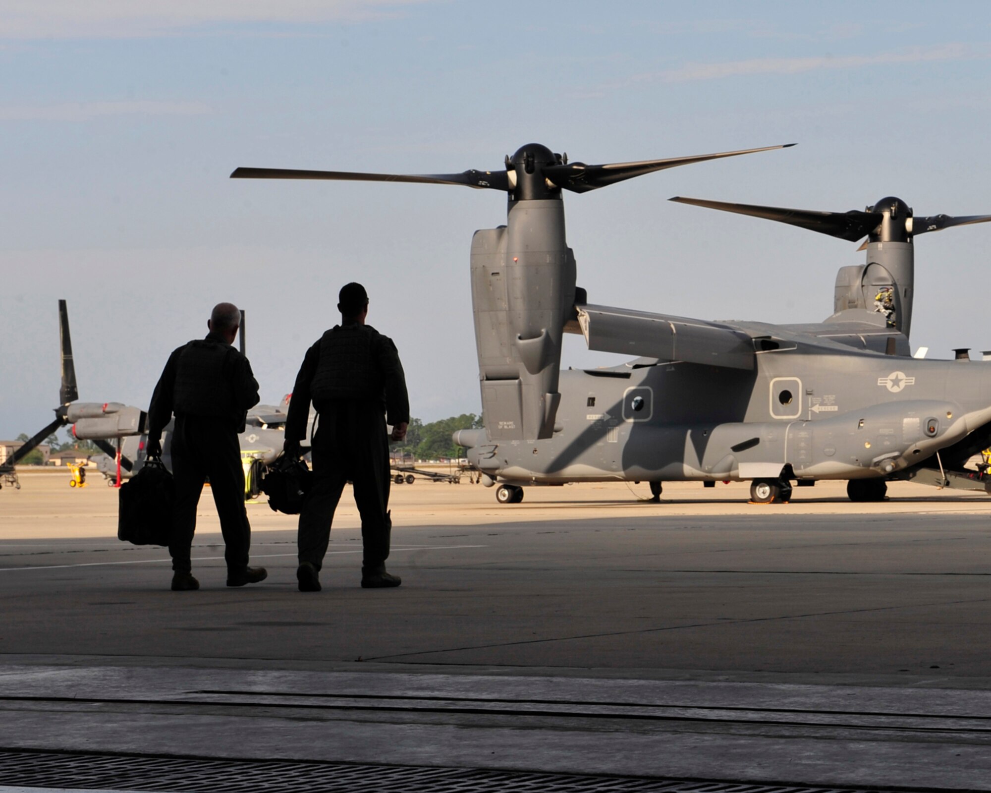 Walking to a CV-22 Osprey for his fini-flight, Lt. Gen. Donny Wurster, commander of Air Force Special Operations Command joins fellow crew member, Staff Sgt. Christopher Curtis, 8th Special Operations Squadron flight engineer, May 12, 2011, Hurlburt Field, Fla. General Wurster will relinquish command to Lt. Gen. Eric Fiel at a ceremony June 24 at 9 a.m. (U.S. Air Force photo by Staff Sgt. Stephanie Jacobs) 
