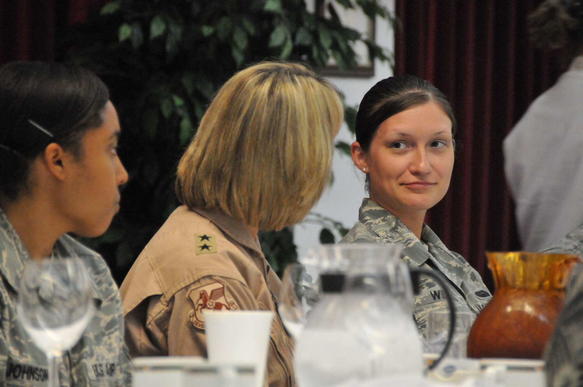 Maj. Gen. Margaret H. Woodward, Commander, 17th Air Force and U.S. Air Forces Africa answers questions during a lunch with Airmen from the 313th Air Expeditionary Wing, June 21, 2011. (U.S. Air Force photo/Capt. John P. Capra)