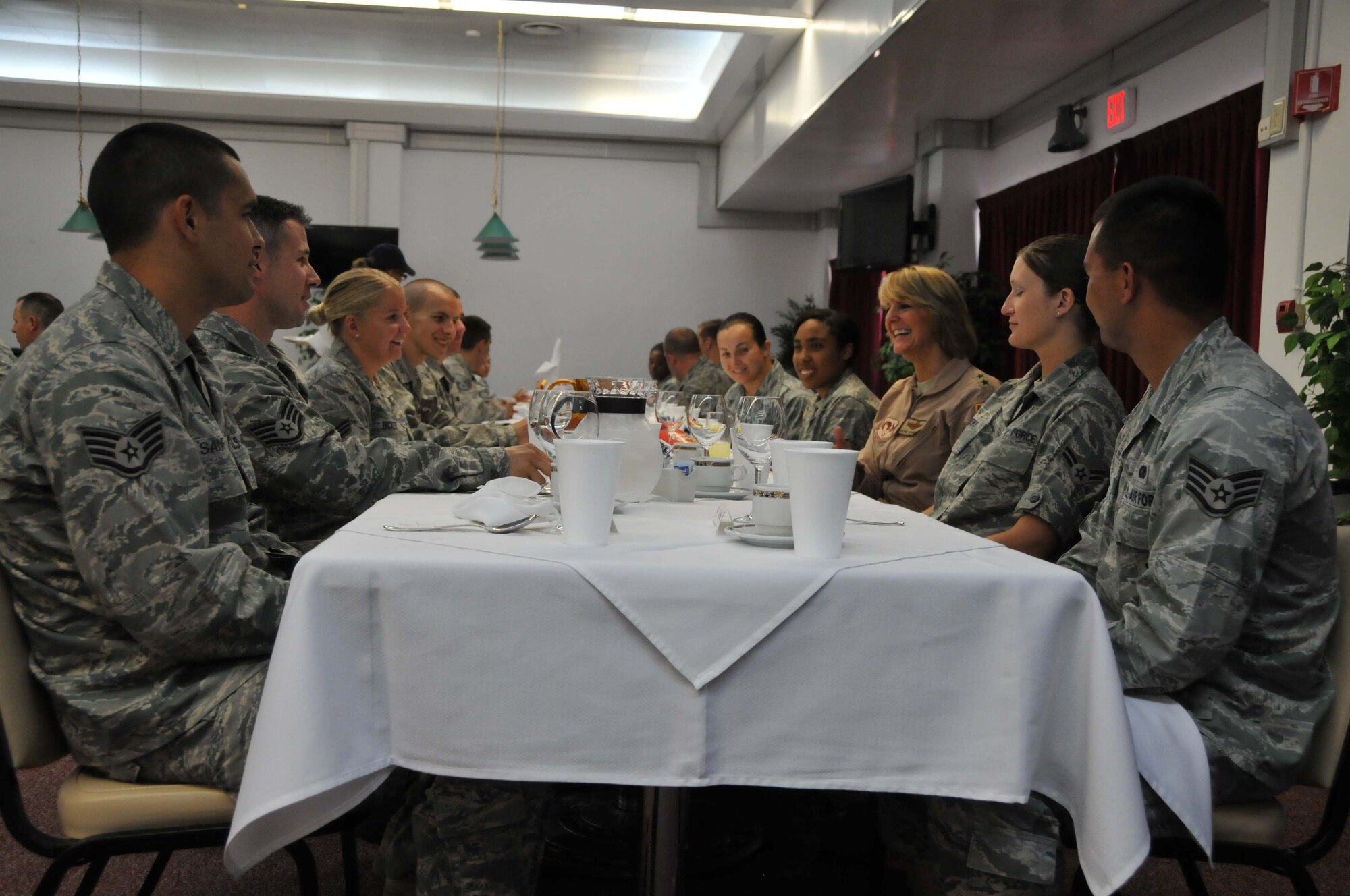 Maj. Gen. Margaret H. Woodward, Commander, 17th Air Force and U.S. Air Forces Africa answers questions during a lunch with Airmen from the 313th Air Expeditionary Wing, June 21, 2011. (U.S. Air Force photo/Capt. John P. Capra)