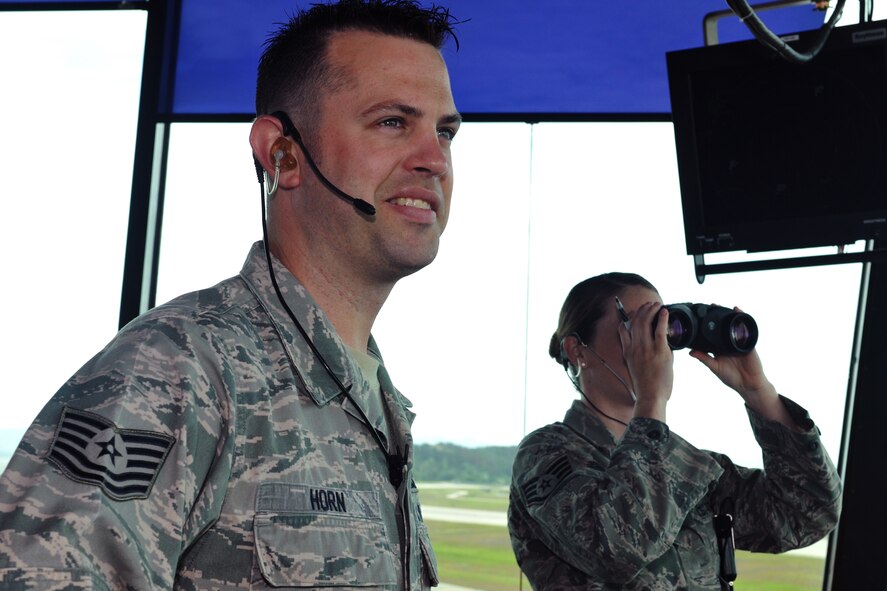 KUNSAN AIR BASE, Republic of Korea -- Tech. Sgt. Terence Bradley Horn, 8th Operations Support Squadron air traffic control watch supervisor, poses for his "Pride of the Pack" feature photo here June 23. (U.S. Air Force photo/Senior Airman Brittany Y. Bateman)