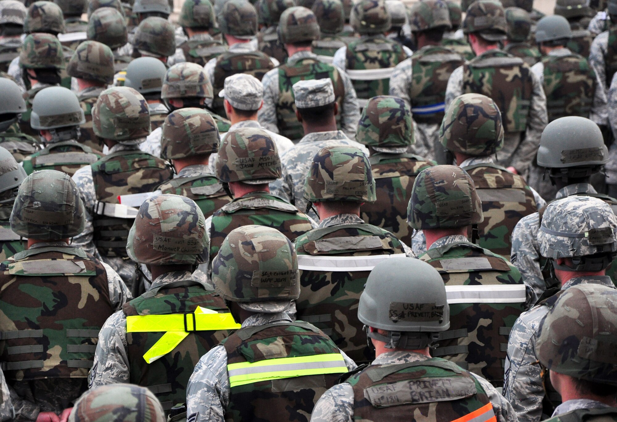 Airmen assigned to the 51st Civil Engineer Squadron, Osan Air Base, Republic of Korea, form up while awaiting the start of their monthly PRIME BEEF training. Approximately 150 Airmen from the 51st Civil Engineer Squadron participated in PRIME BEEF training June 22 at Osan. Prime BEEF forces have the necessary command, control and communications to support beddown; fire emergency services; emergency management; explosive ordnance disposal; expedient construction; explosive incident response; chemical, biological, radiological and nuclear response and other specialized mission areas. (U.S. Air Force photo/Staff Sgt. Chad Thompson)