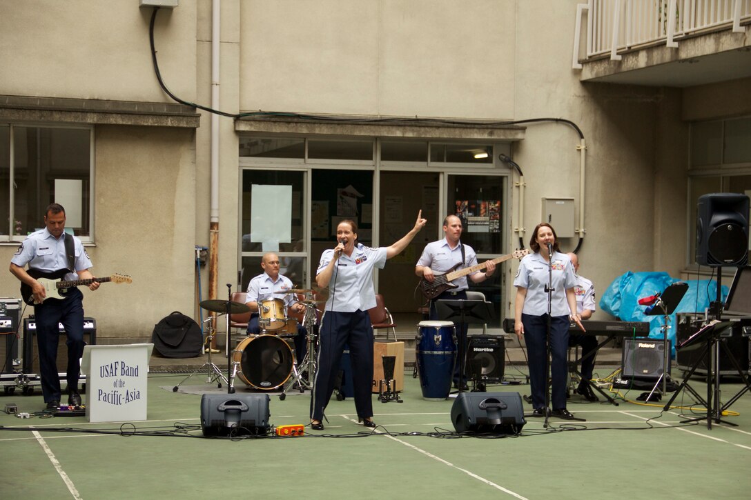 Pacific Trends, part of the USAF Band of the Pacific, performs for displaced Fukushima residents