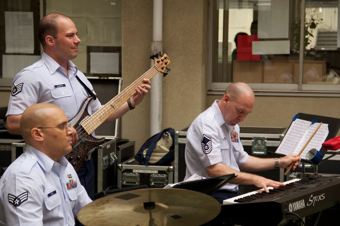 Pacific Clave, part of the USAF Band of the Pacific, performs for displaced Fukushima residents