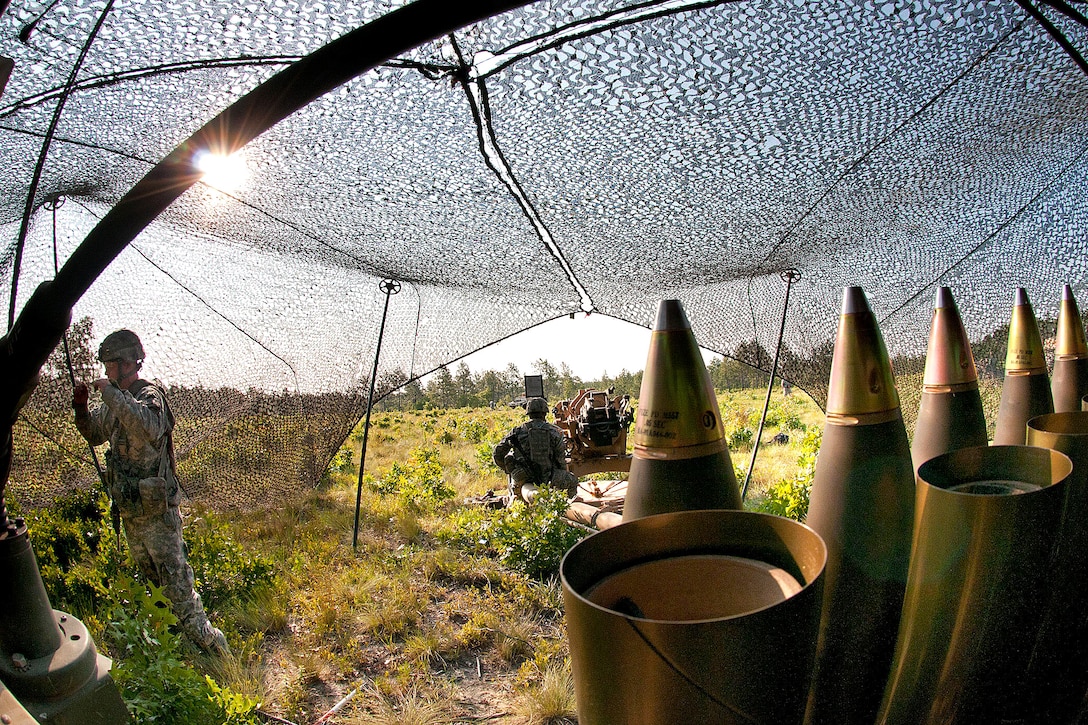 Artillery shells stand ready for Army paratroopers during a platoon evaluation field exercise on Fort Bragg, N.C., June 15, 2011.