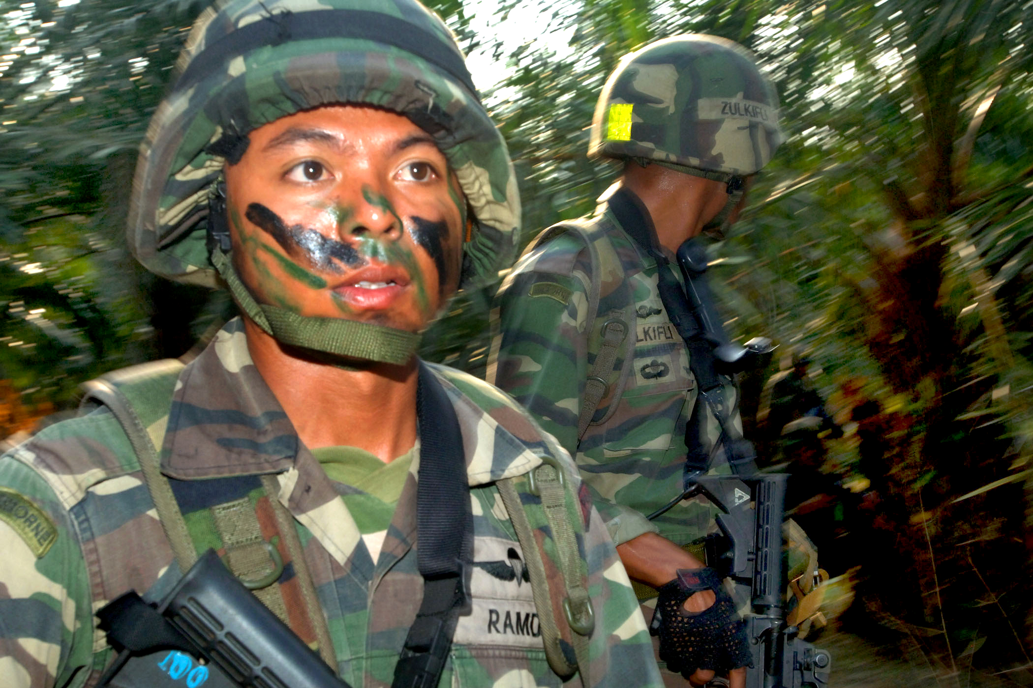 U S Marines And Malaysian Army Soldiers Advance Rapidly Through The u-s-marines-and-malaysian-army-soldiers-advance-rapidly-through-the