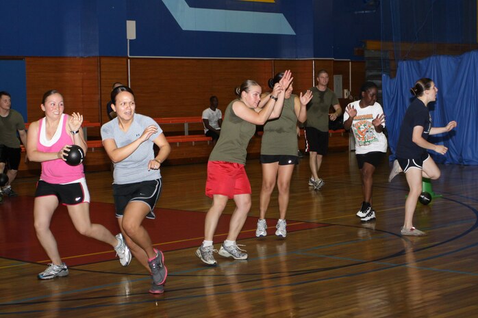 Team members from RMD Supply B attempt to dodge the ball as they participated inthe round-robin dodgeball tournament at the IronWorks Gym sports courts here June 24. They were unable to win a game but held on throughout the tournament .
