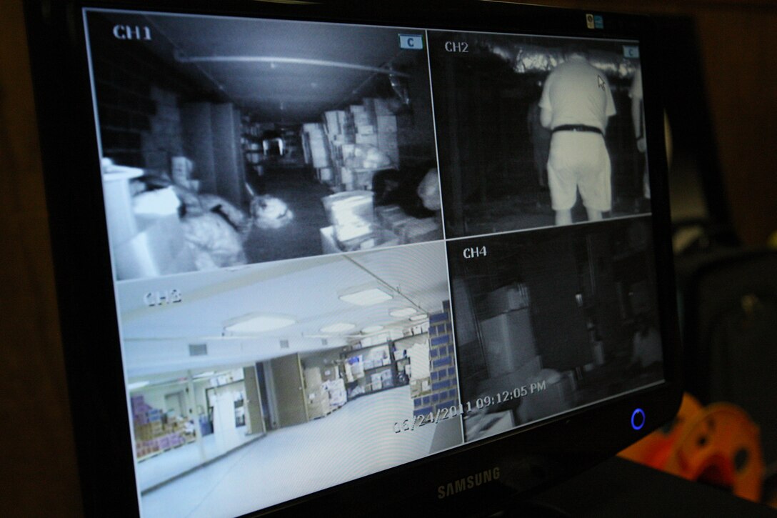 A monitor displays video from cameras place in different rooms during a preliminary investigation with the South East Paranormal Investigators Association at the Jacksonville USO, June 24. The purpose of the investigation was to try and capture evidence of any paranormal activity, which would be shown at the fundraiser investigation event with Sy Fy’s Amy Bruni of Ghost Hunters, Sy Fy’s John and Chris Zaffis of Haunted Collector and Eric and Jessica Dionne of SEPIA, hosted by Ideal Event Management, scheduled for July 30.