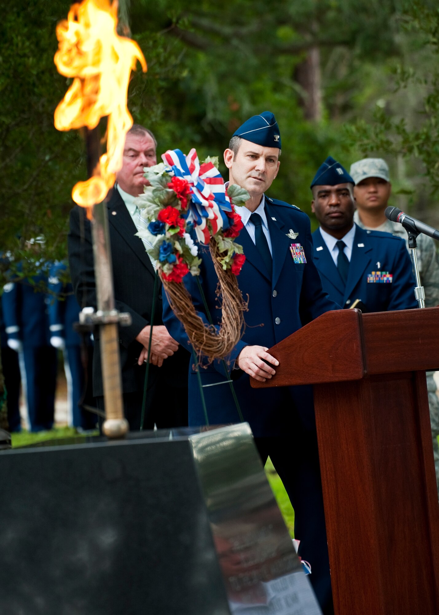 Col. Andrew Toth, the 33rd Fighter Wing commander, addresses the families of the victims of the Khobar Towers bombing during a memorial ceremony June 24, 2011, at Eglin Air Force Base, Fla. June 25 marks the 15th anniversary of the bombing. (U.S. Air Force photo/Samuel King Jr.)