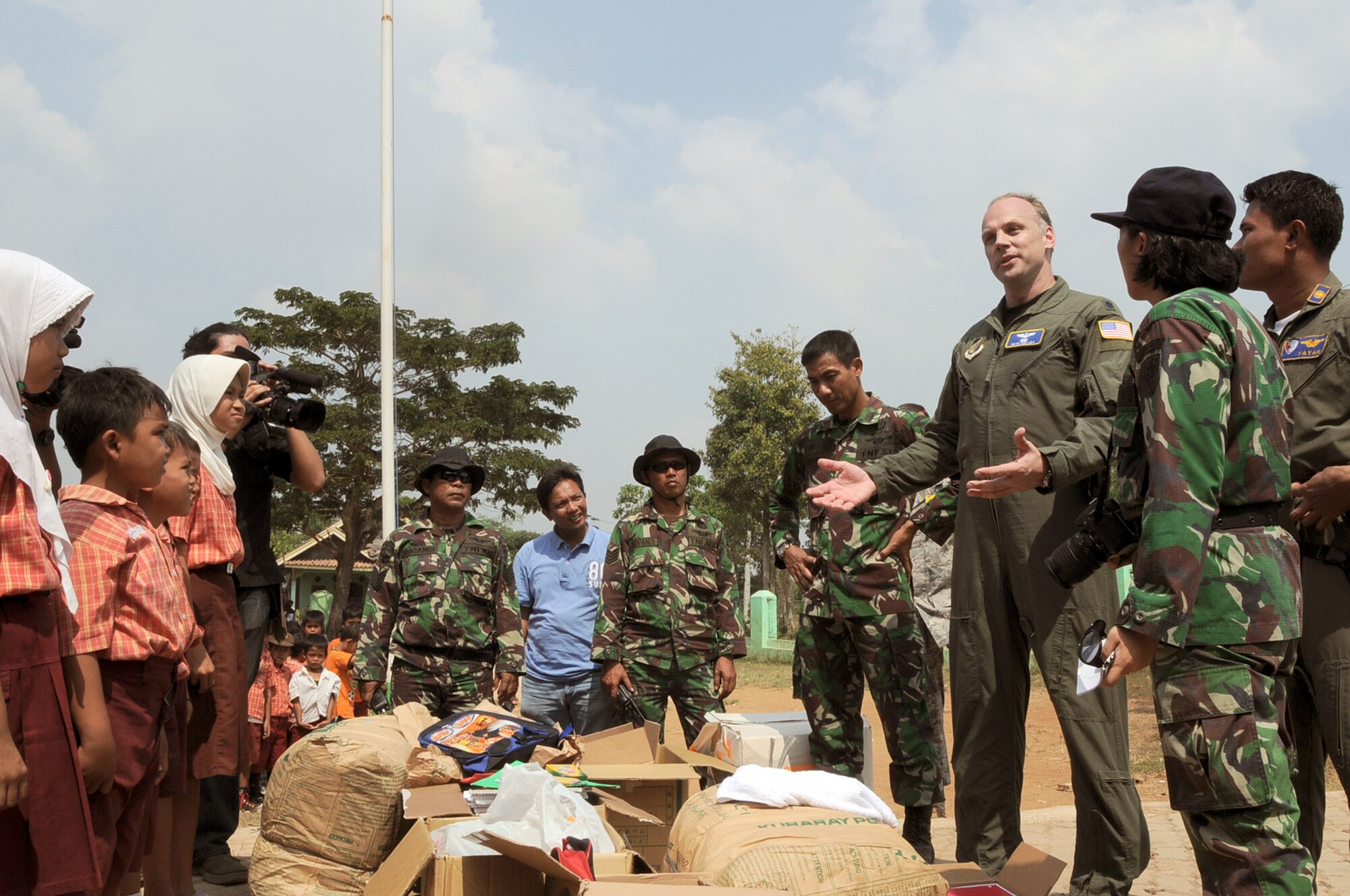 Lt. Col. Pete Kelley speaks to students during a goodwill visit to an elementary school in Binguang district, Indonesia, as part of Cope West 11. Colonel Kelley is the commander of the Cope West 11 detachment from Yokota Air Base, Japan. (U.S. Air Force photo/Capt. Raymond Geoffroy)