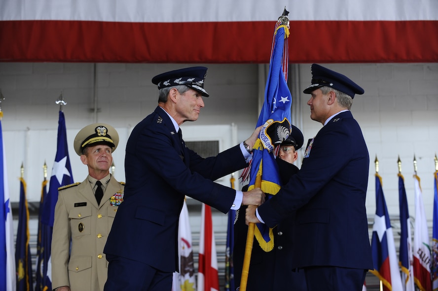 U.S. Air Force Lt. Gen. Eric Fiel (right), accepts the command of the Air Force Special Operations Command from Air Force Chief of Staff Gen. Norton Schwartz, Hurlburt Field, Fla., June 24, 2011. General Fiel was the vice commander, Headquarters U.S. Special Operations Command, Washington, DC. (U.S. Air Force photo by Staff Sgt. Julianne M. Showalter/Released)