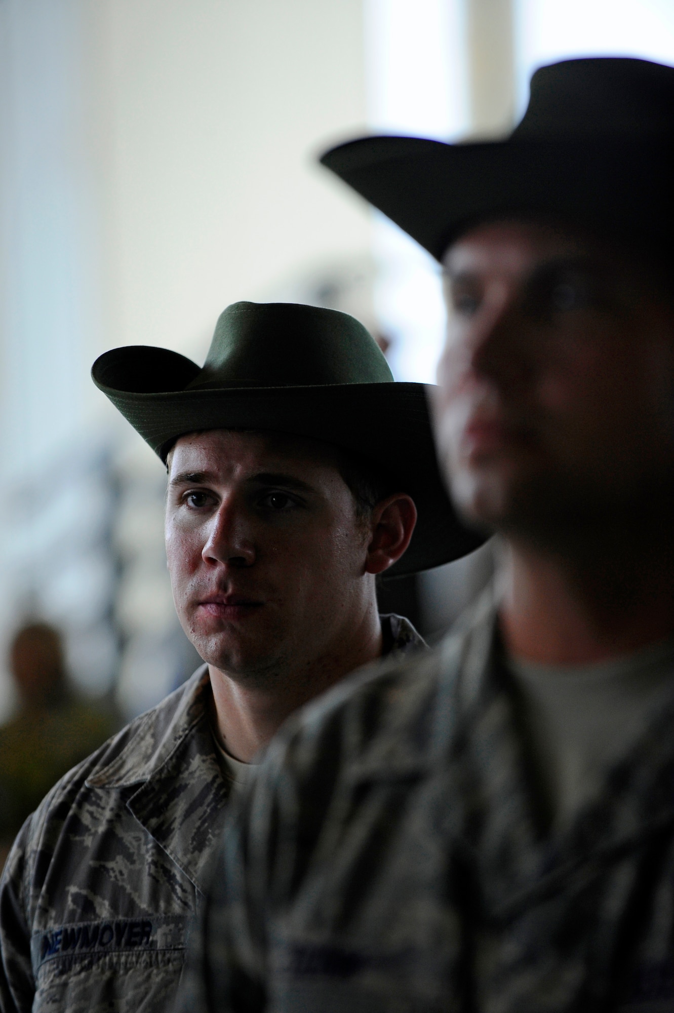 U.S. Air Force Senior Airman Dwight Newmoyer, Air Force Special Operations Command Special Tactics Training Squadron, stands in the Air Commando Heritage formation at the AFSOC change of command ceremony, Hurlburt Field, Fla., June 24, 2011. Airman Newmoyer and others wore bush hats, which were declared the official headgear for Air Commando units by the former Chief of Staff Gen. Curtis LeMay. (U.S. Air Force photo by Staff Sgt. Julianne M. Showalter/Released)
