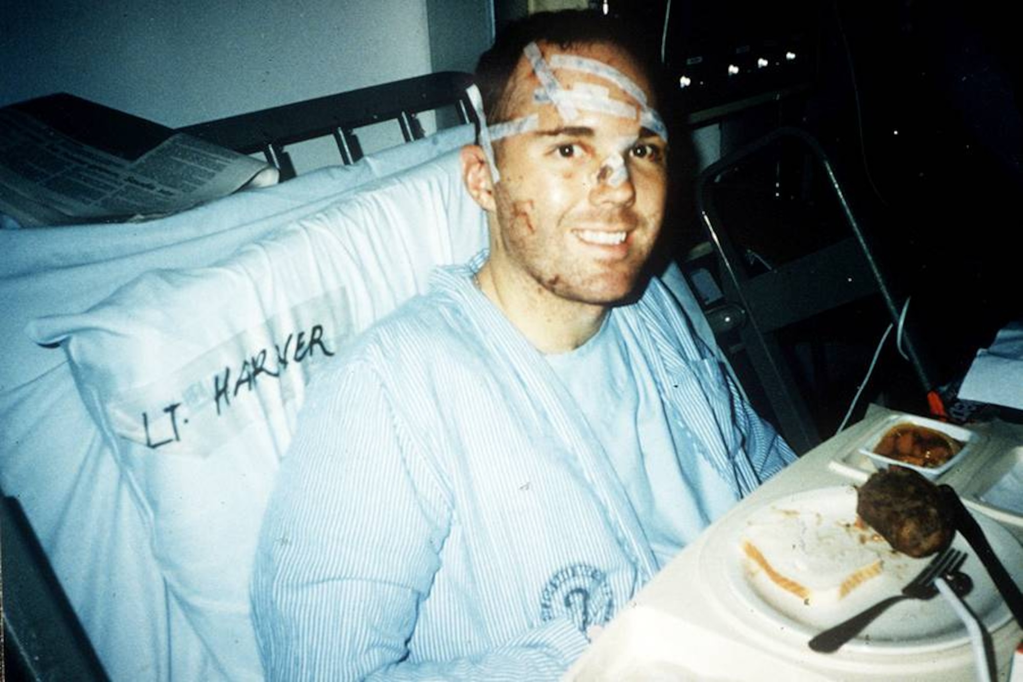 Then 1st Lt. Mike Harner smiles for the camera in a hospital bed while recovering from unjuries sustained in the Khobar towers bombing on June 25, 1996. Lt. Col. Mike Harner is now the commander of the 14th Civil Engineering Squadron. (Courtesy photo)