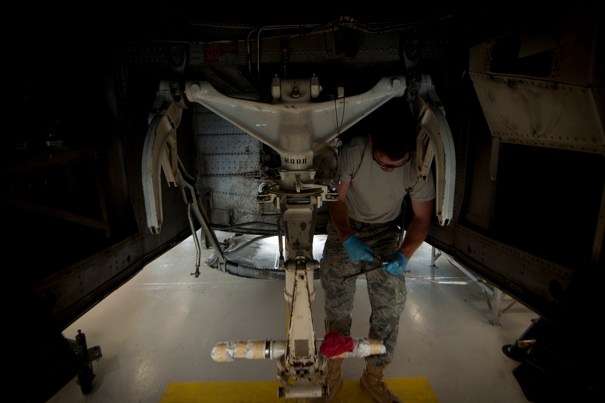 U.S. Air Force Senior Airman David Johnson, 23rd Component Maintenance Squadron hydraulic inspection specialist, prepares to replace hydraulic filters during an HC-130P Combat King 550-day inspection at Moody Air Force Base, Ga., June 20, 2011. Airman Johnson’s main duty during the inspection is to look over the hydraulic system and fix any problems to ensure the aircraft is mission-ready. (U.S. Air Force photo by Airman 1st Class Joshua Green/Released)