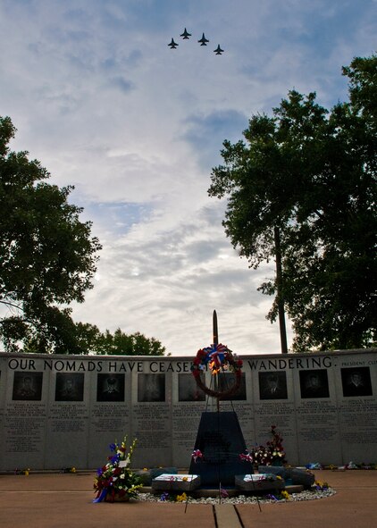 F-16s from the 33rd Fighter Wing fly in a missing-man formation over the Khobar Towers Memorial June 24 at Eglin Air Force Base, Fla.  June 25 marks the 15th anniversary of the tragic bombing that killed 19 service members including 12 33rd FW Airmen.  Each year, a ceremony is held by the Nomads to commemorate their brothers who’ve “ceased their wandering.”  (U.S. Air Force photo/Samuel King Jr.)