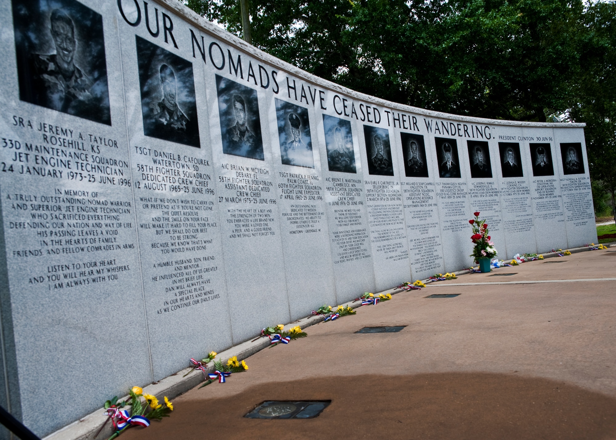 Flowers were placed for each of the fallen 33rd Fighter Wing Nomads at the Khobar Towers Memorial June 24 at Eglin Air Force Base, Fla.  June 25 marks the 15th anniversary of the tragic bombing that killed 19 service members including 12 33rd FW Airmen.  Each year, a ceremony is held by the Nomads to commemorate their brothers who’ve “ceased their wandering.”  (U.S. Air Force photo/Samuel King Jr.)