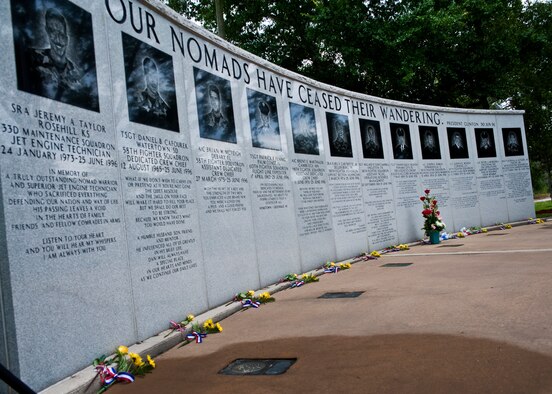 Flowers were placed for each of the fallen 33rd Fighter Wing Nomads at the Khobar Towers Memorial June 24 at Eglin Air Force Base, Fla.  June 25 marks the 15th anniversary of the tragic bombing that killed 19 service members including 12 33rd FW Airmen.  Each year, a ceremony is held by the Nomads to commemorate their brothers who’ve “ceased their wandering.”  (U.S. Air Force photo/Samuel King Jr.)