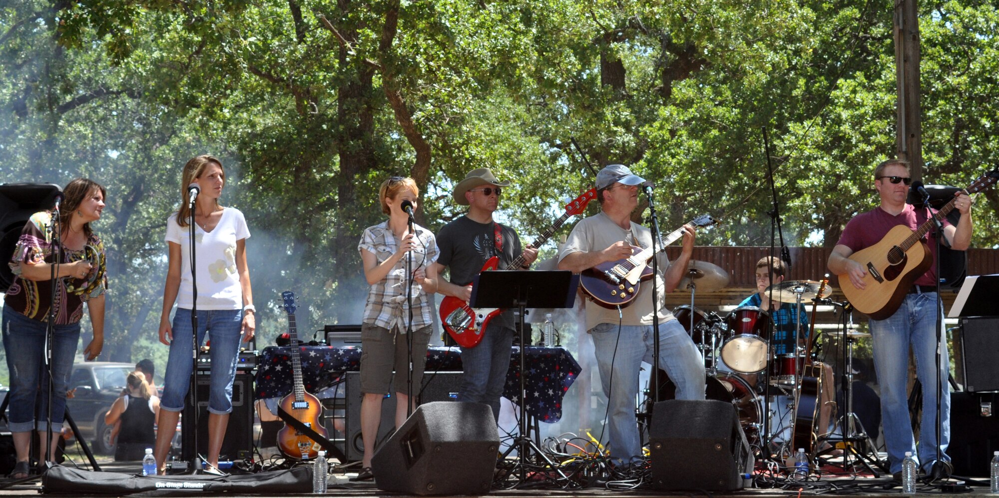 The band, 7-Car Pileup, performed during the 301st  Fighter Wing Family Day June 4. Lt. Col. Max Stitzer, 301st Maintenance Group commander, is the frontman for the band who played a wide range of music from rock, pop and country genres. (U.S. Air Force photo/ Staff Sgt. Chris Bolen)
