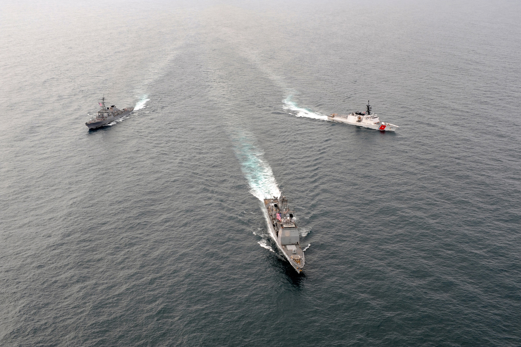 KODIAK, Alaska - The USS Lake Erie, front, an Aegis-class guided missle-cruiser homeported in Pearl Harbor and the USS Decatur, an Arleigh Burke-class guided-missle destroyer homeported in San Diego and the Coast Guard Cutter Bertholf, a national security cutter homeported in Alameda, Calif., transit the Gulf of Alaska in formation June 17, 2011, during Northern Edge 11. (Photo by Coast Guard Petty Officer 3rd Class Charly Hengen)




